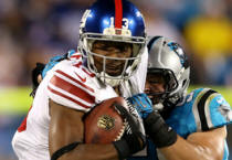 Ramses Barden Ramses Barden #13 of the New York Giants runs for yards after the catch in the first half against Luke Kuechly #59 of the Carolina Panthers at Bank of America Stadium on September 20, 2012 in Charlotte, North Carolina.
