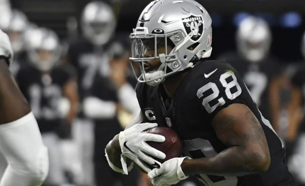 Las Vegas Raiders running back Josh Jacobs dekes and dodges Baltimore  Ravens en route to second TD run