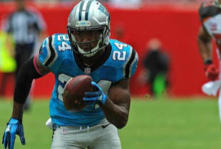 Carolina Panthers cornerback Josh Norman heads for he end zone after intercepting a pass by Tampa Bay Buccaneers quarterback Jameis Winston in the first quarter Sunday. Each big play Norman makes drives up the value of his next contract.